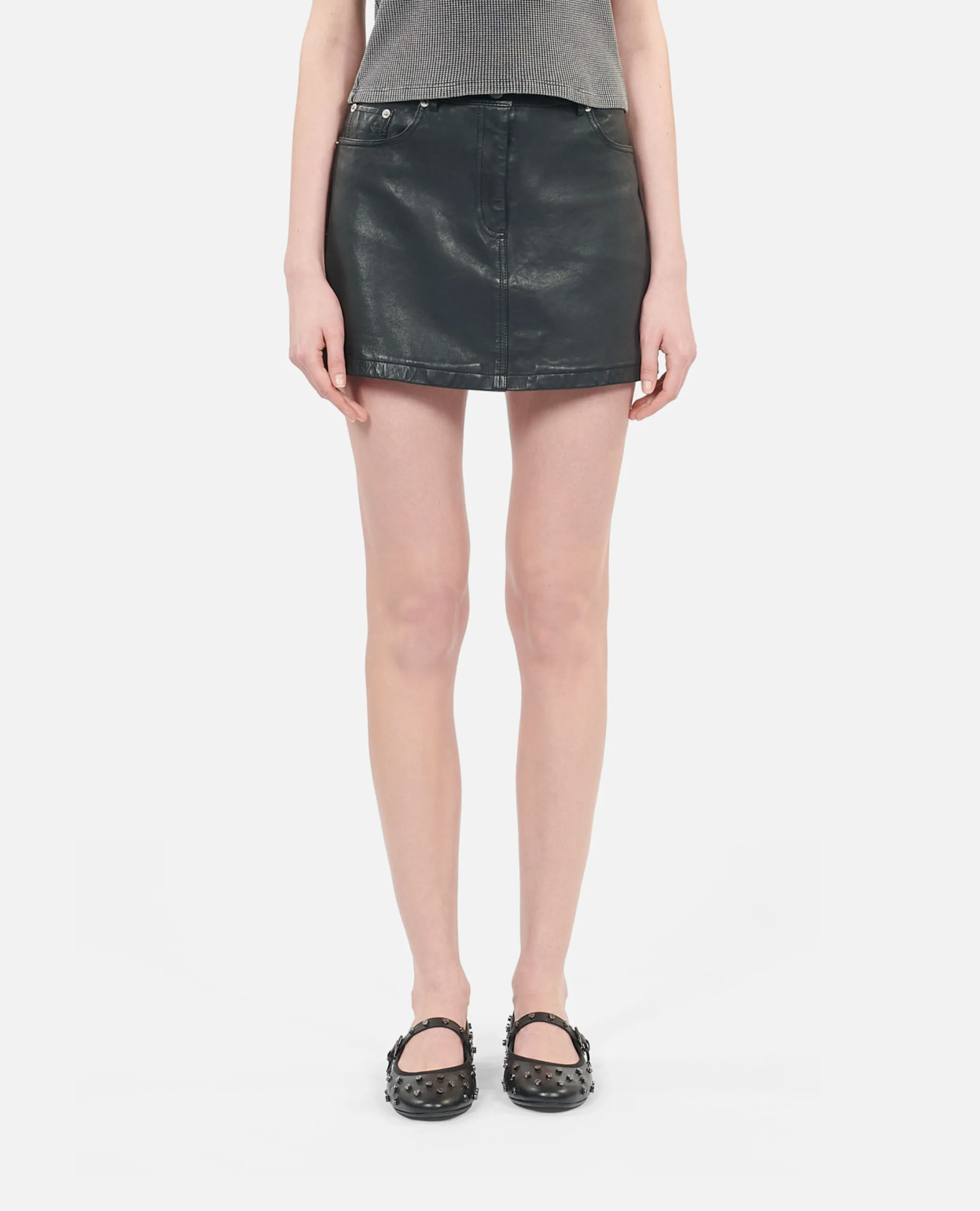 Short black leather skirt