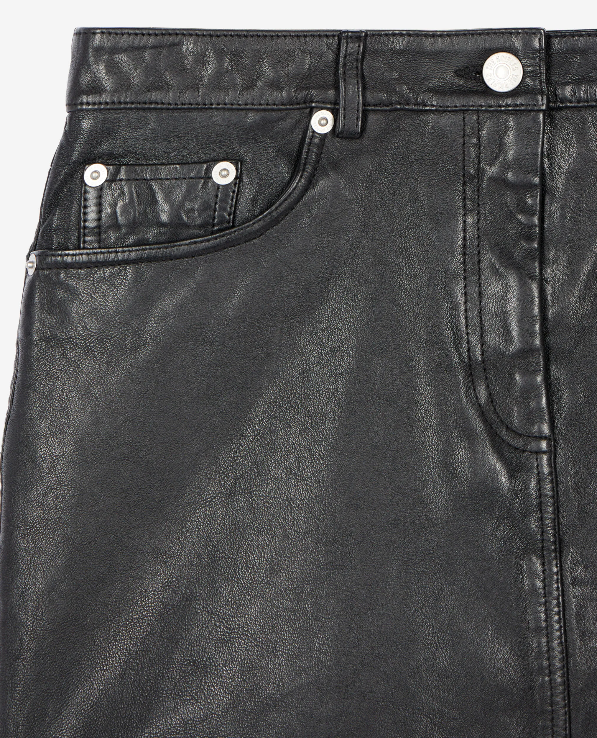 Short black leather skirt