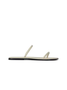 Toteme The City Slide Sandals | Luxury and style at your fingertips